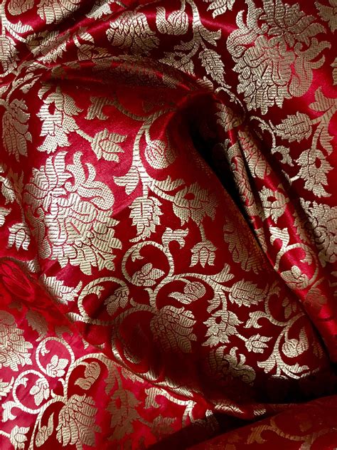 red and gold brocade fabric